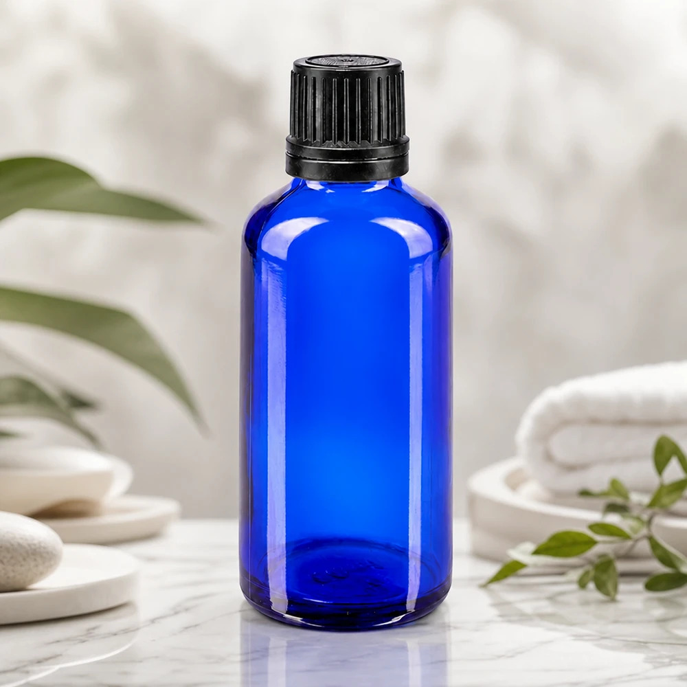 Frasco conta-gotas azul de 50 ml com aplicador de 1 mm para uma dosagem precisa de óleos essenciais