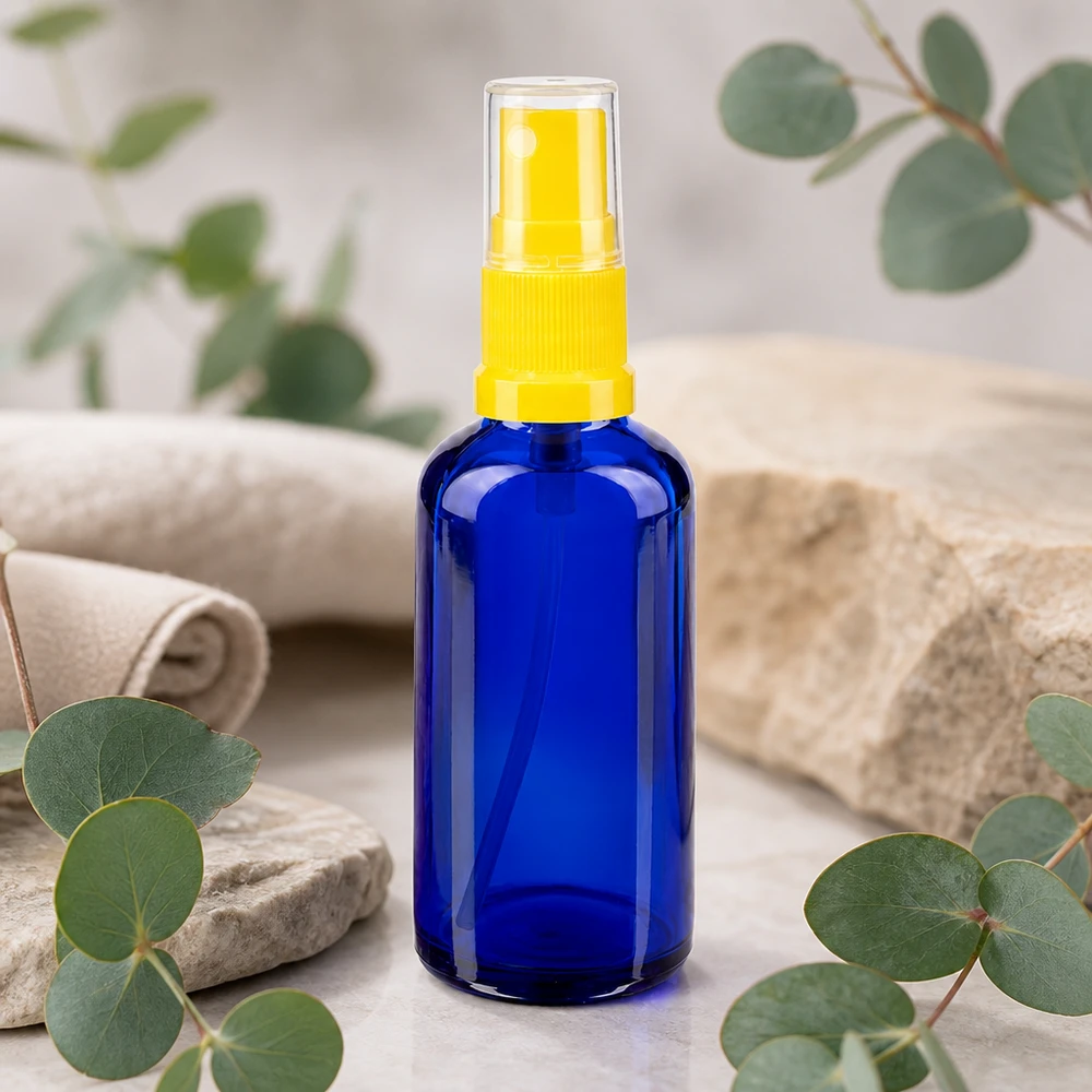 Frasco de spray azul de farmácia de 50 ml com tampa protetora transparente e pulverizador amarelo