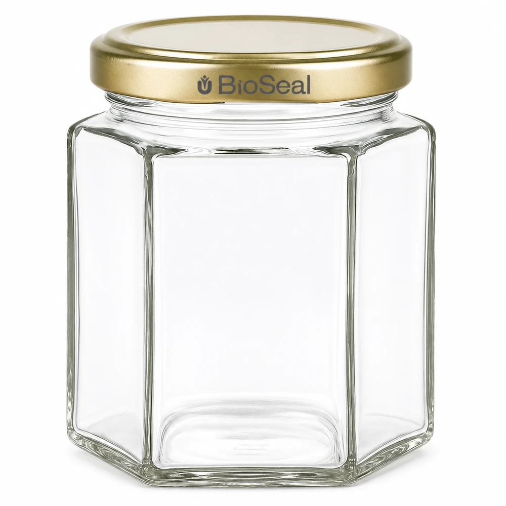 Frasco de mel de 250 g hexagonal com tampa de rosca BioSeal dourada Frasco de vidro transparente vazio para mel