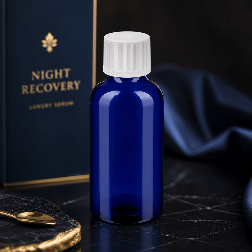 Frasco de vidro compacto de 50 ml com proteção UV graças à cor azul e à tampa branca