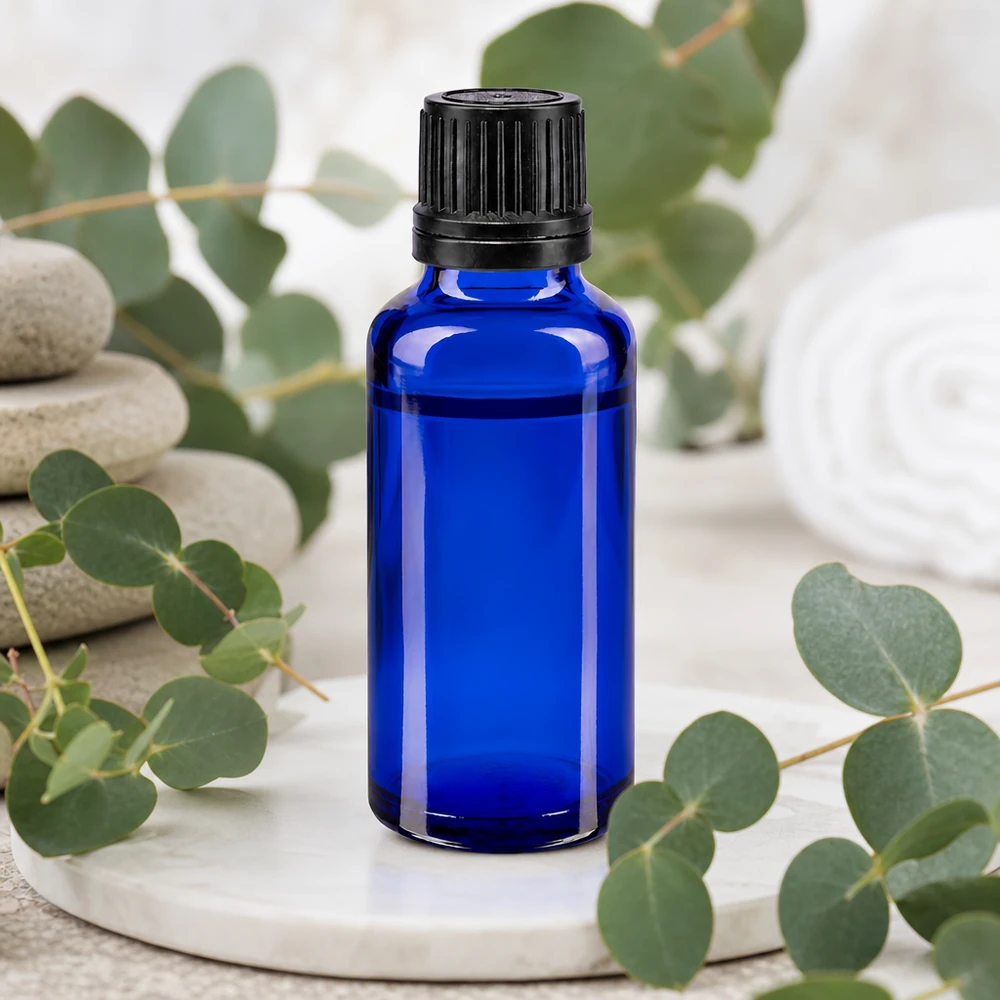 Frasco de vidro azul cobalto de 30 ml com abertura para gotas de 1 mm e tampa de segurança preta