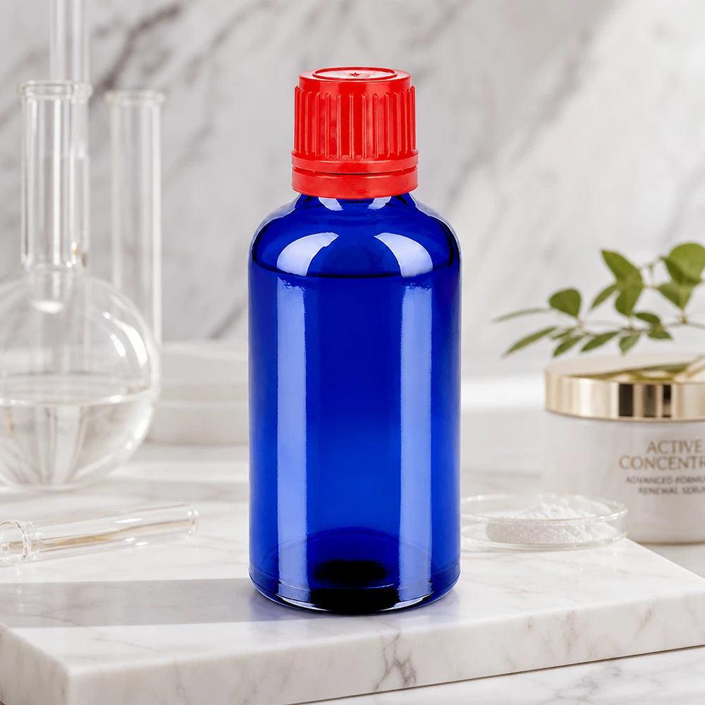 Frasco de 50ml com tampa de rosca de 11mm vermelha com fecho inviolável BlueLine UT18/50 Frasco pequeno de 50 ml em azul-cobalto elegante com tampa vermelha prática SV 11mm OV BlueLine UT18/50