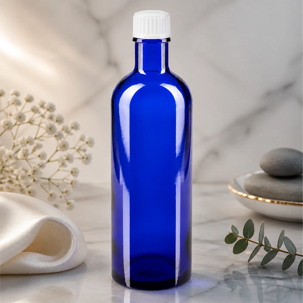 Frasco cilíndrico de farmácia de 200 ml em azul cobalto com tampa de rosca de plástico branca