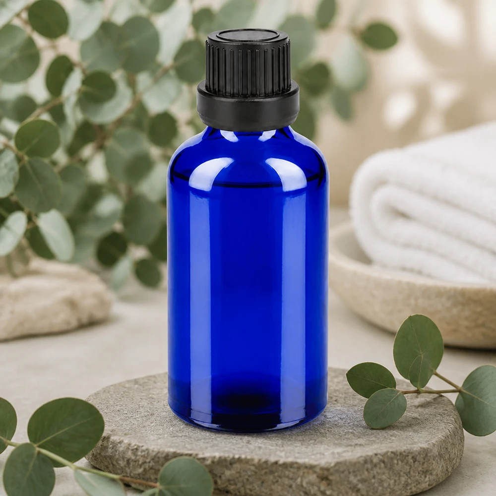 Frasco de vidro compacto de 50 ml em azul-cobalto com tampa de rosca preta para guardar
