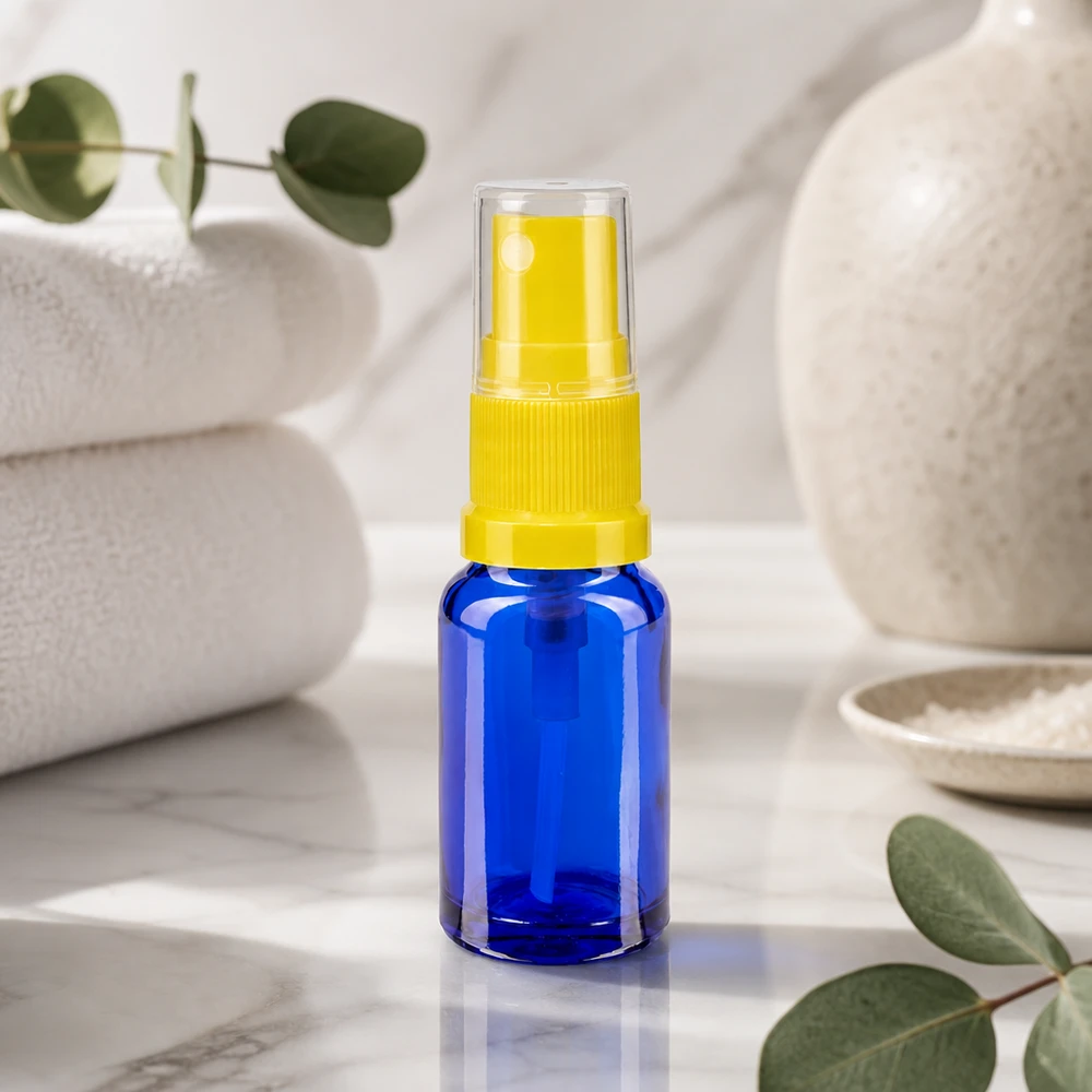 Apothekenflasche blau 30ml Sprayaufsatz gelb Frasco pulverizador compacto para farmácia, em vidro azul, de 30 ml, com bico pulverizador amarelo e tampa de segurança