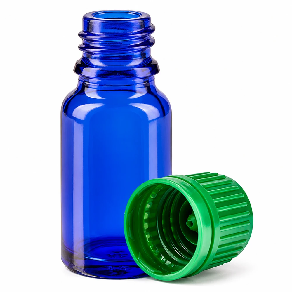 Frasco pequeno de vidro azul-cobalto de 10 ml com tampa verde para aromaterapia e cosméticos naturais