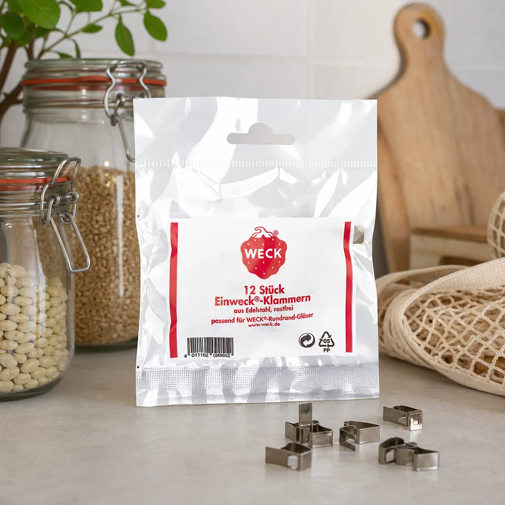Pinças Original WECK (Pack(s) com 12 peças) WECK Klammern Lifestyle Aufnahme Küchenambiente mit Vorratsgläsern Schneidebrett natürliche Deko 12 Stück Edelstahl