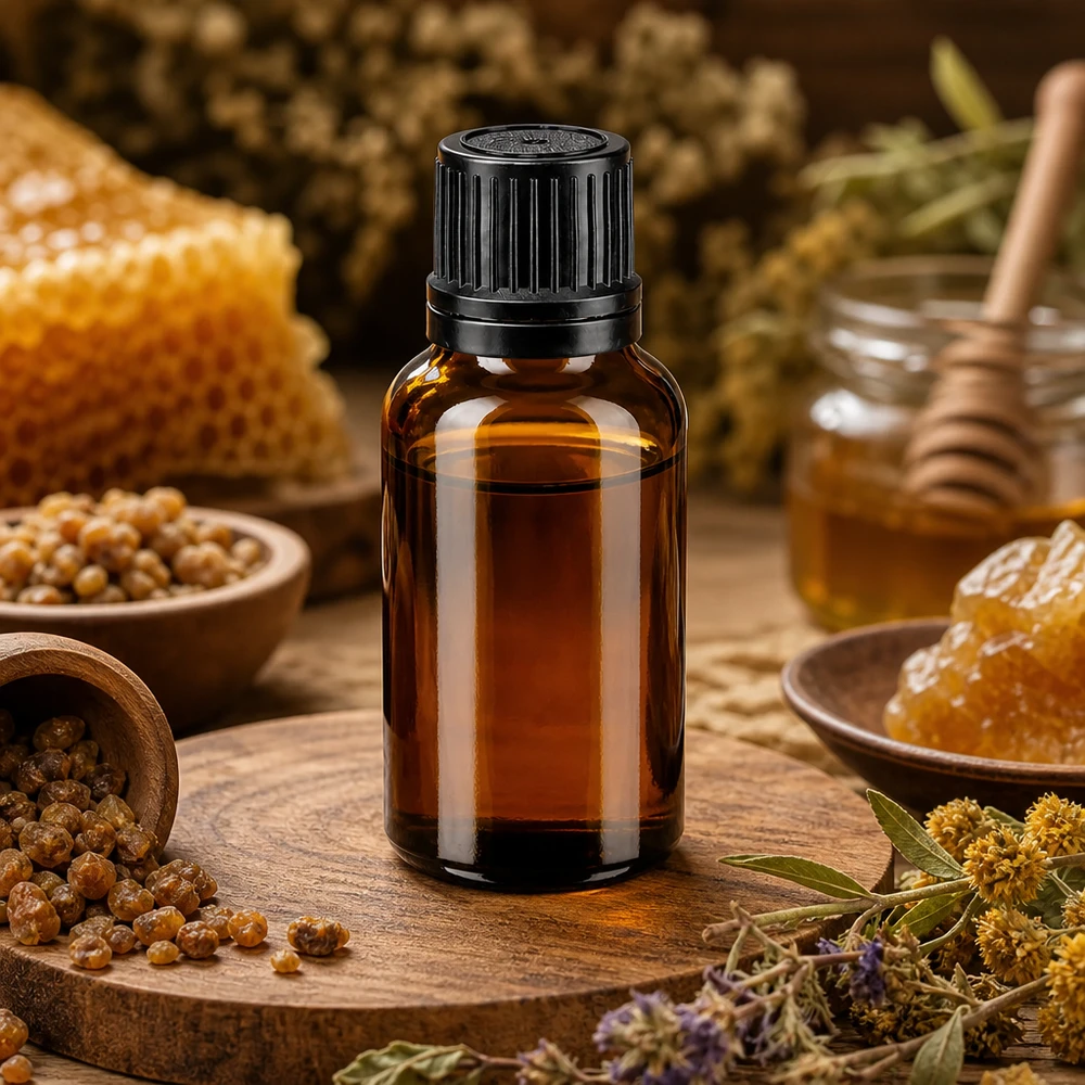 Frasco de vidro âmbar de 20 ml com tampa OV preta, rodeado por favos de mel e ervas medicinais