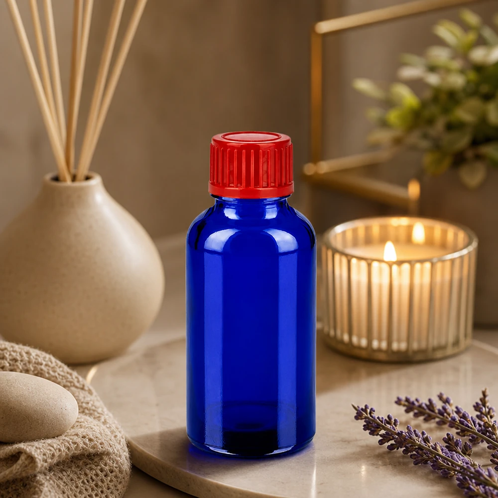 Frasco de vidro robusto de 30 ml com proteção UV graças ao vidro azul e à tampa vermelha segura