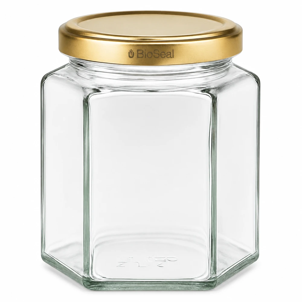Frasco Hexa de 390 ml com tampa BioSeal dourada UNiTWIST Frasco de vidro hexagonal UNiTWIST Hexa390 com tampa dourada TO70 BioSeal para alimentos e conservas