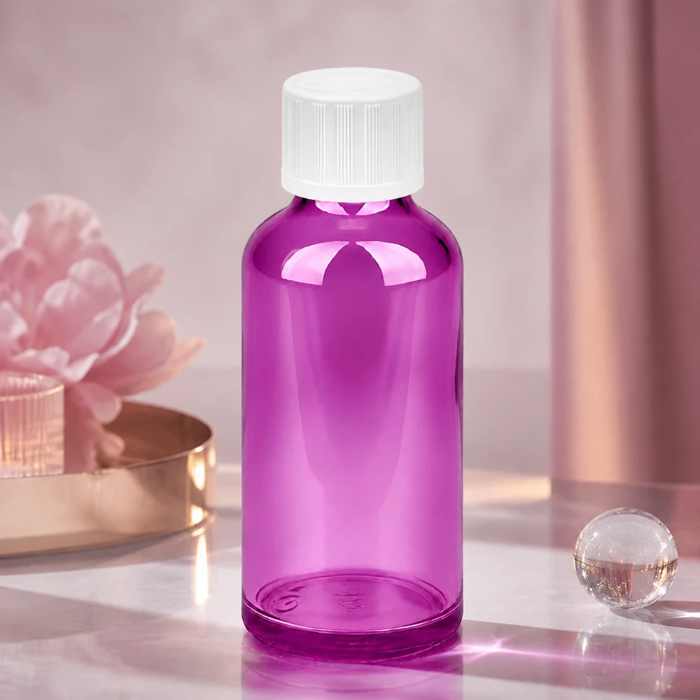 Frasco conta-gotas de 50 ml com abertura de 1,2 mm num elegante aspeto púrpura para aplicações de aromaterapia
