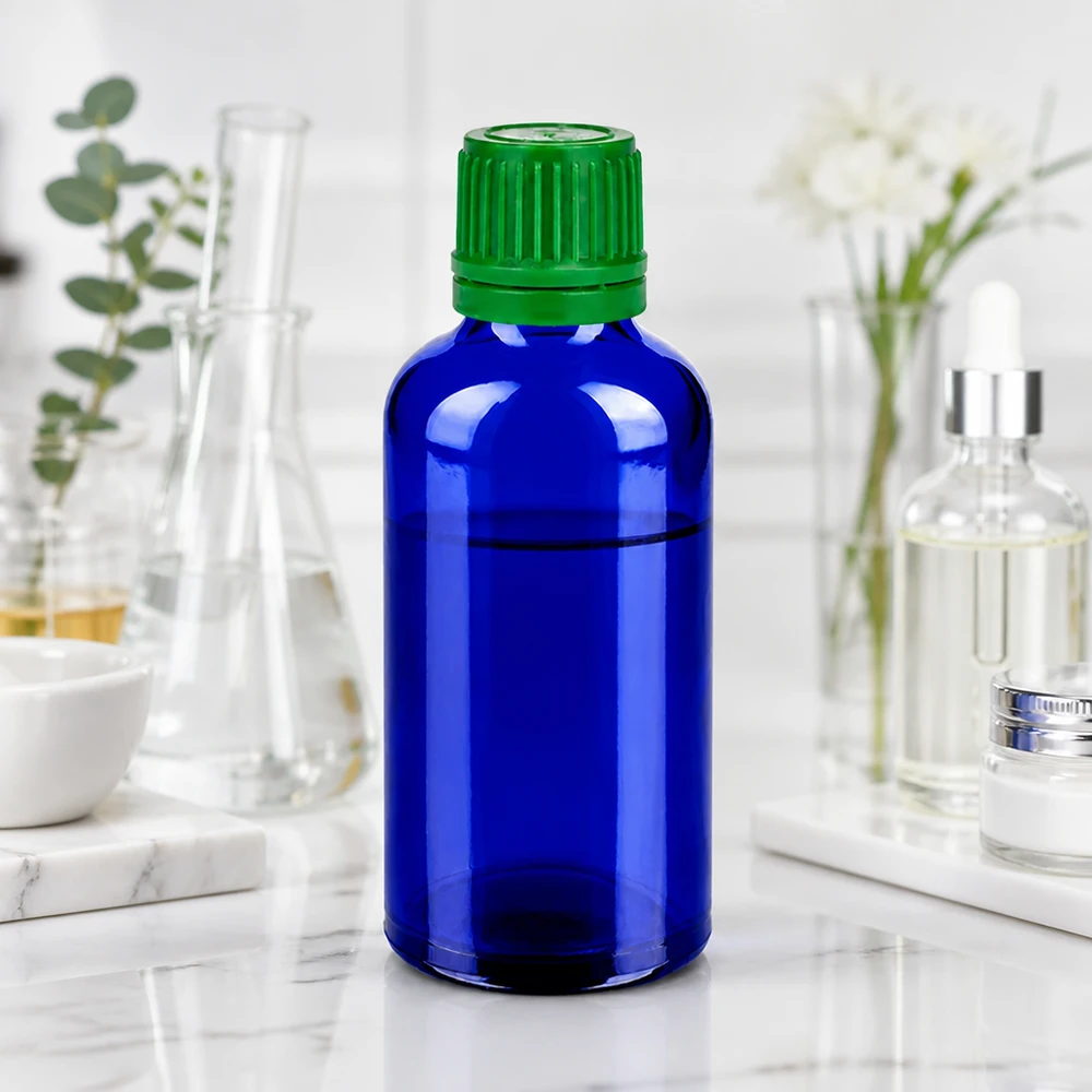Frasco de proteção contra a luz 50ml em vidro azul com proteção UV e tampa verde à prova de crianças