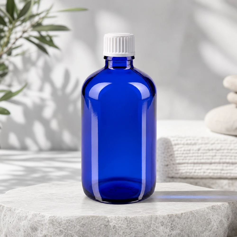 Frasco de farmácia azul de 100 ml com proteção UV e tampa branca padrão para óleos essenciais