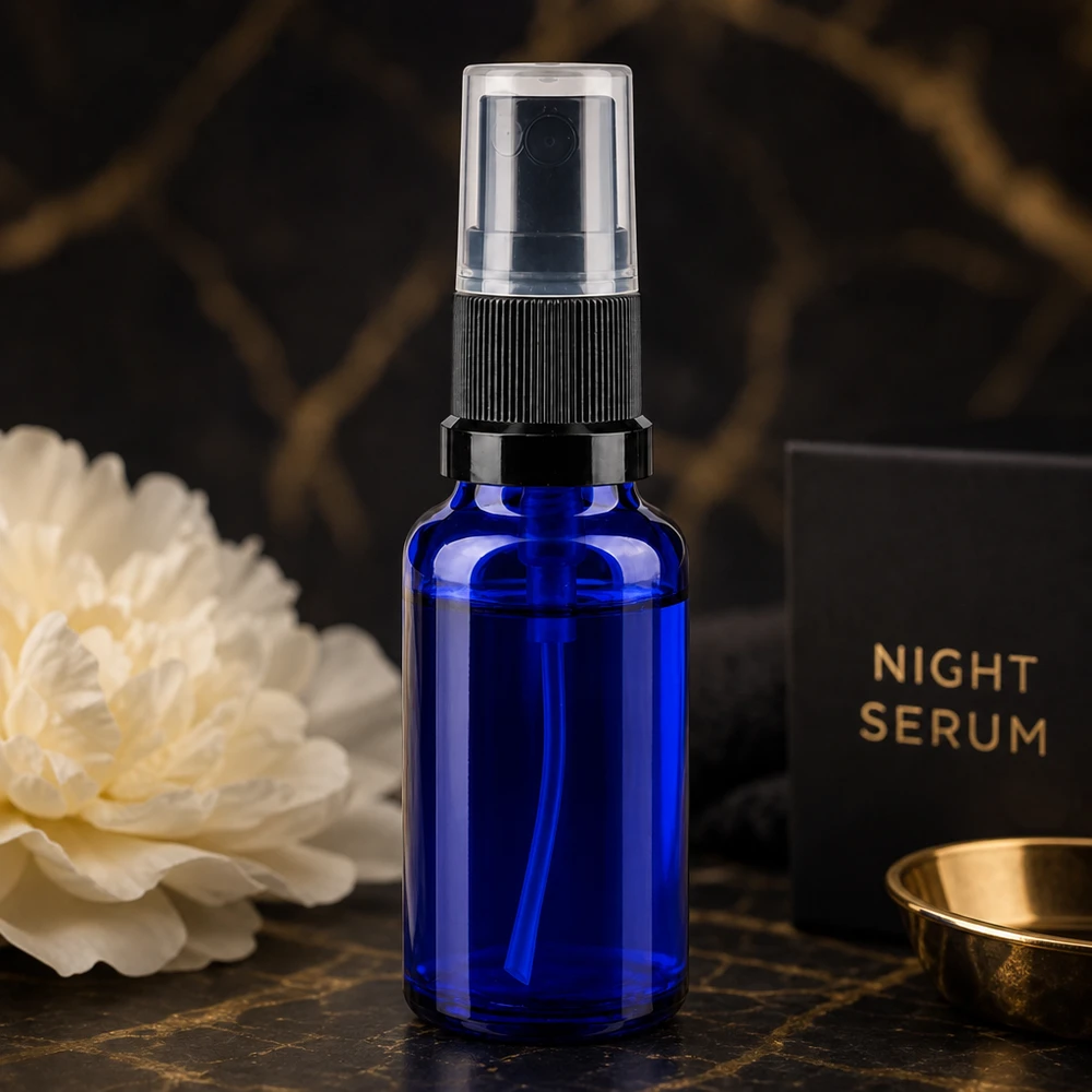 Frasco pulverizador azul de 20 ml, em vidro de farmácia, com pulverizador preto, para servir de recipiente para o sérum noturno