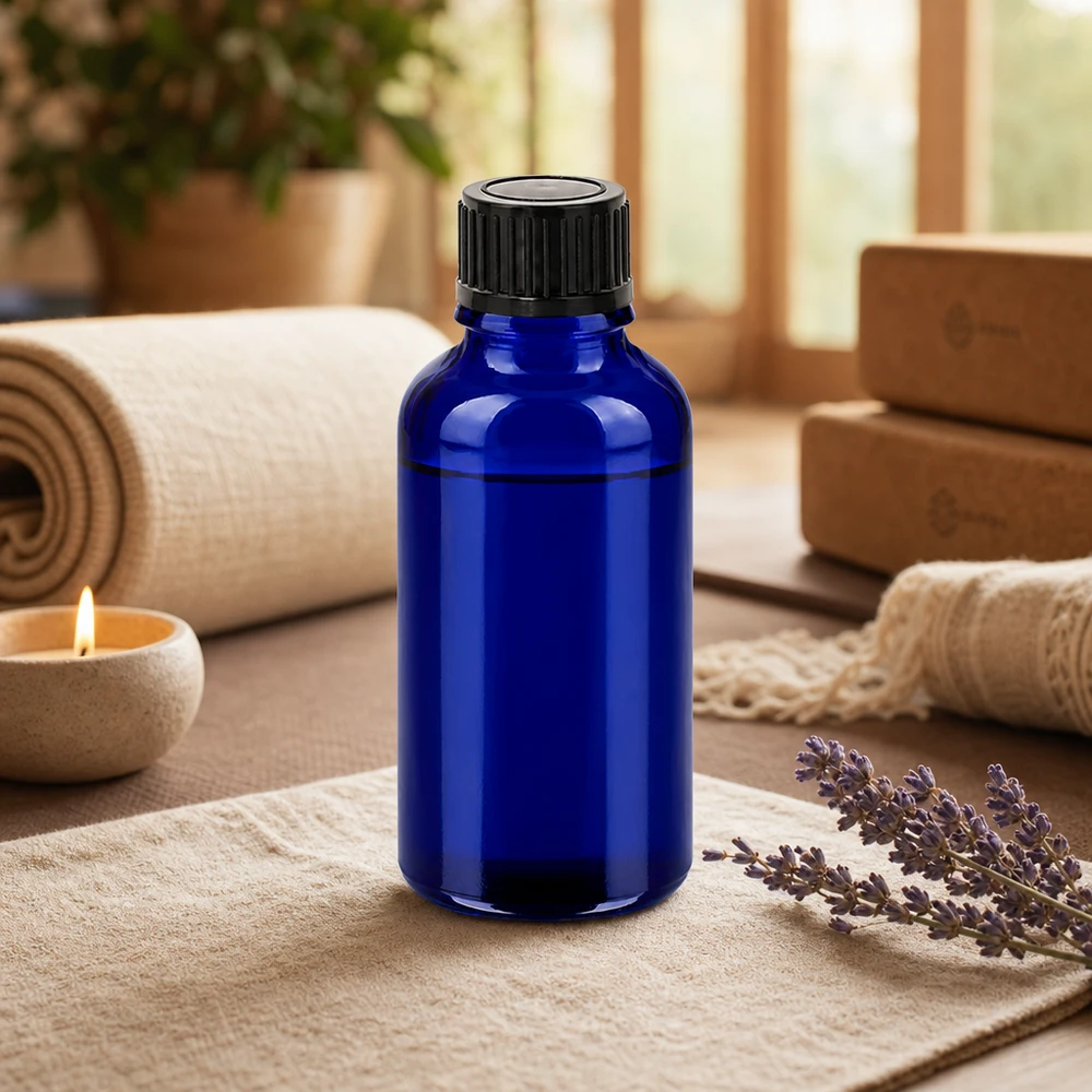 Frasco compacto de vidro azul de 30 ml com abertura de 11 mm e tampa preta normalizada para utilização móvel