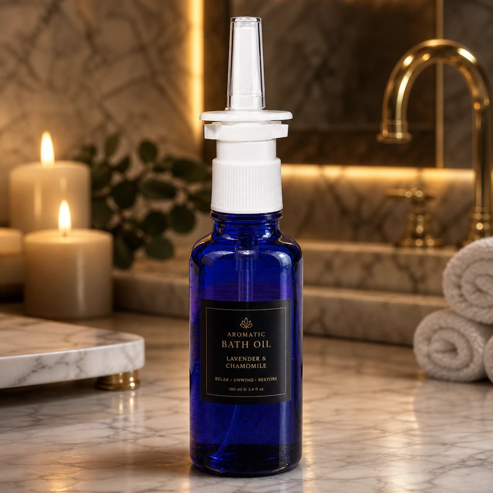 Pequeno frasco de 30 ml para spray nasal, em vidro farmacêutico azul cobalto, com bico dosador padrão