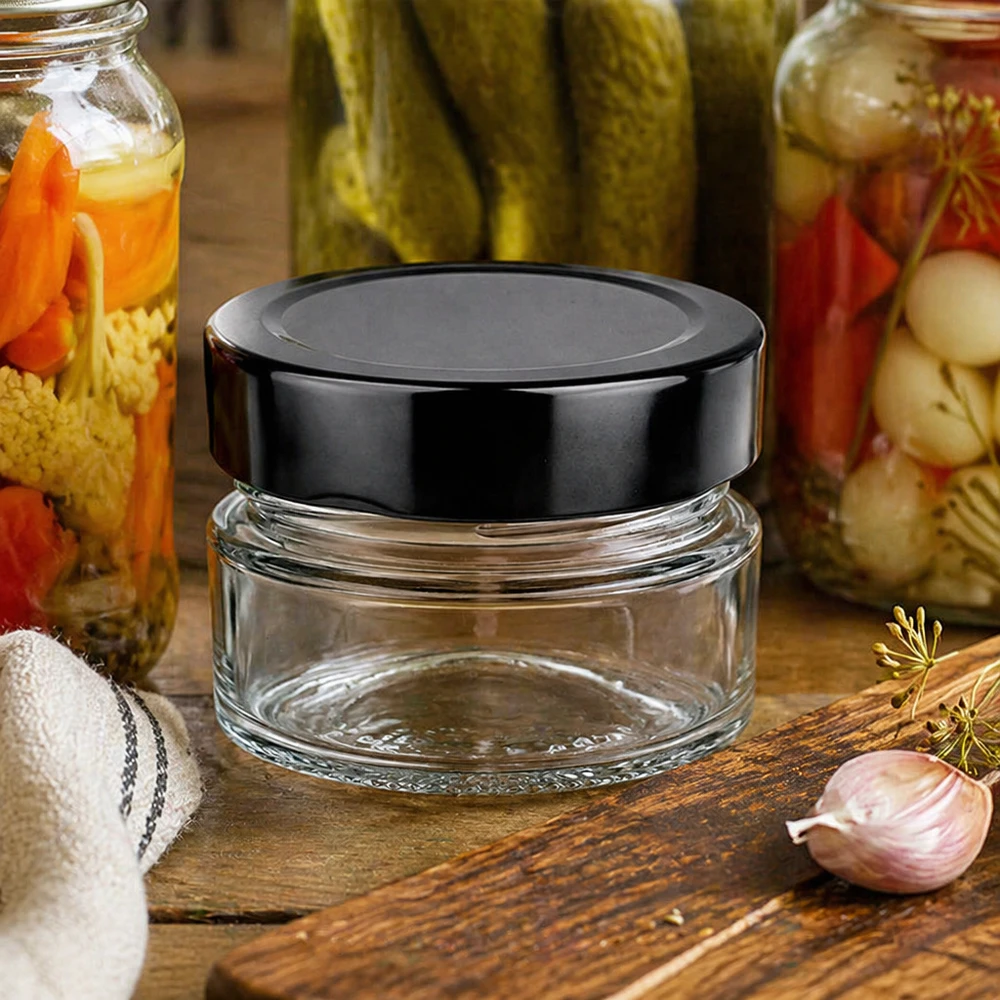 Frasco redondo de 80 ml BasicSeal preto UNiTWIST cena de cozinha frascos para conservas tábua de madeira alho endro conservação