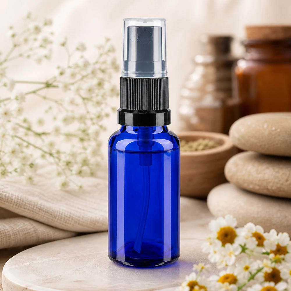 Frasco pulverizador azul de 20 ml em vidro borossilicato com pulverizador preto, com motivos de mármore e flores