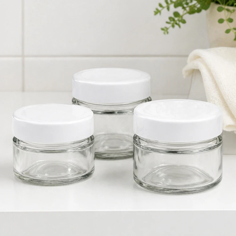 Frasco redondo de 80ml com tampa BasicSeal branco fundo UNiTWIST Conjunto de frascos redondos de 80 ml com tampa BasicSeal na casa de banho - frascos de vidro elegantes para cosméticos e utensílios de casa de banho