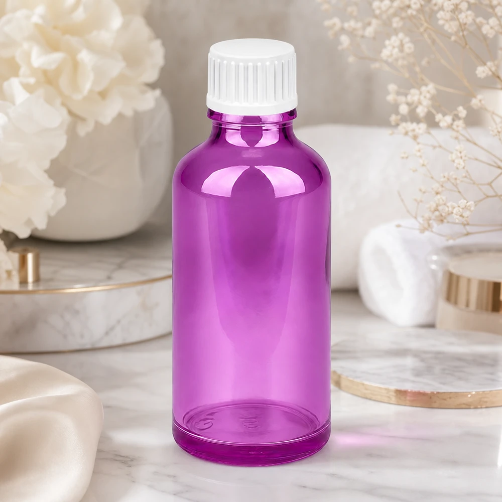 Frasco conta-gotas de 50 ml com abertura de precisão de 0,9 mm em roxo para uma distribuição exacta das gotas