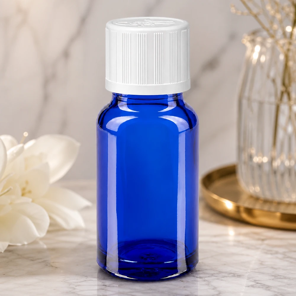 Frasco de farmácia azul cobalto de 10 ml com tampa de segurança para crianças branca, com acabamento em mármore