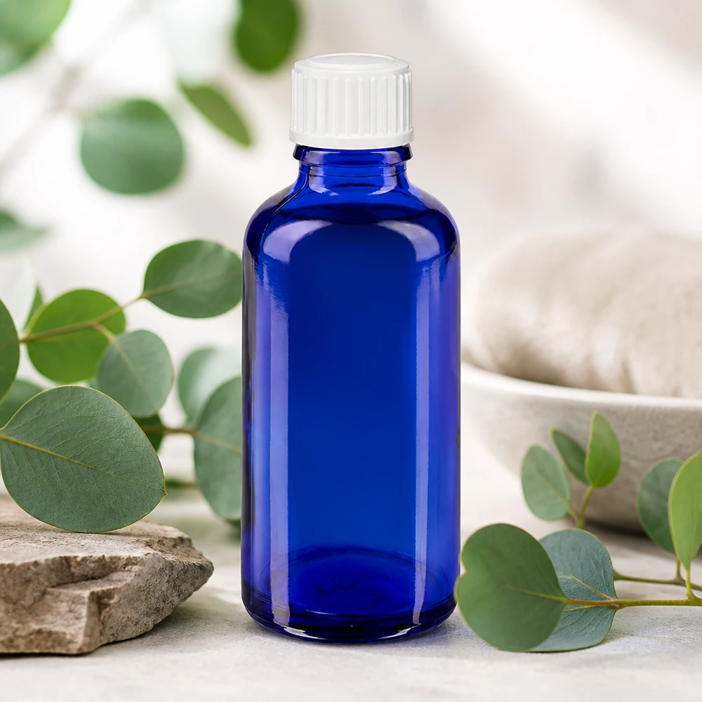Frasco de farmácia azul cobalto de 50 ml com tampa de segurança para crianças branca e aplicador conta-gotas de 0,9 mm
