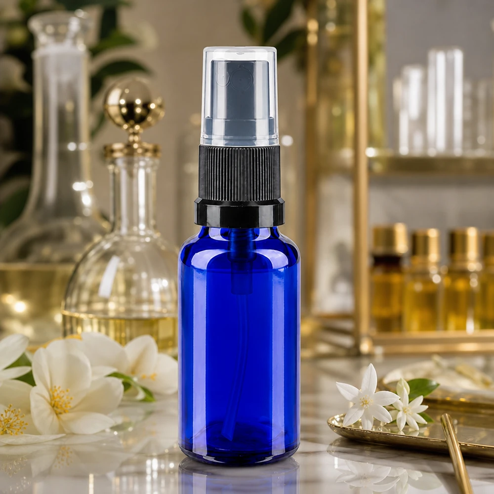 Frasco pulverizador azul de 20 ml em vidro de farmácia, com pulverizador preto e tampa protetora transparente
