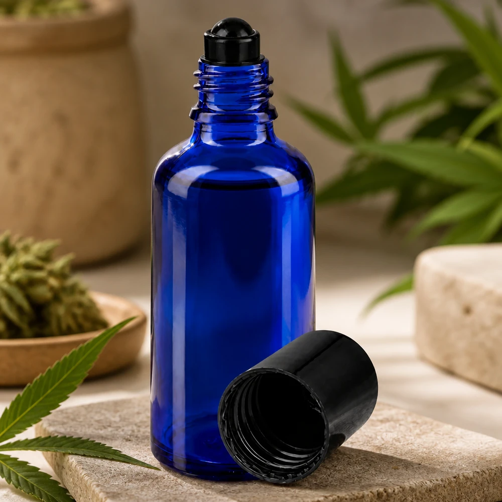 Frasco roll-on azul cobalto de 50 ml com esferinha preta para óleos essenciais e produtos de CBD