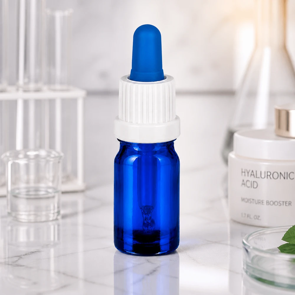 Frasco pipeta de 5 ml branco/azul com fecho inviolável BlueLine UT18/5 Frasco de pipeta profissional BlueLine de 5 ml com tampa UT18 branca para cosmética e farmácia