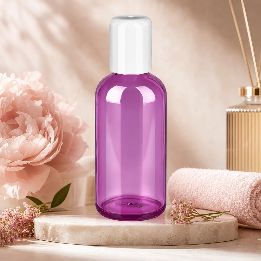 Frasco roll-on transparente de 100 ml numa elegante cor púrpura com um prático aplicador esférico