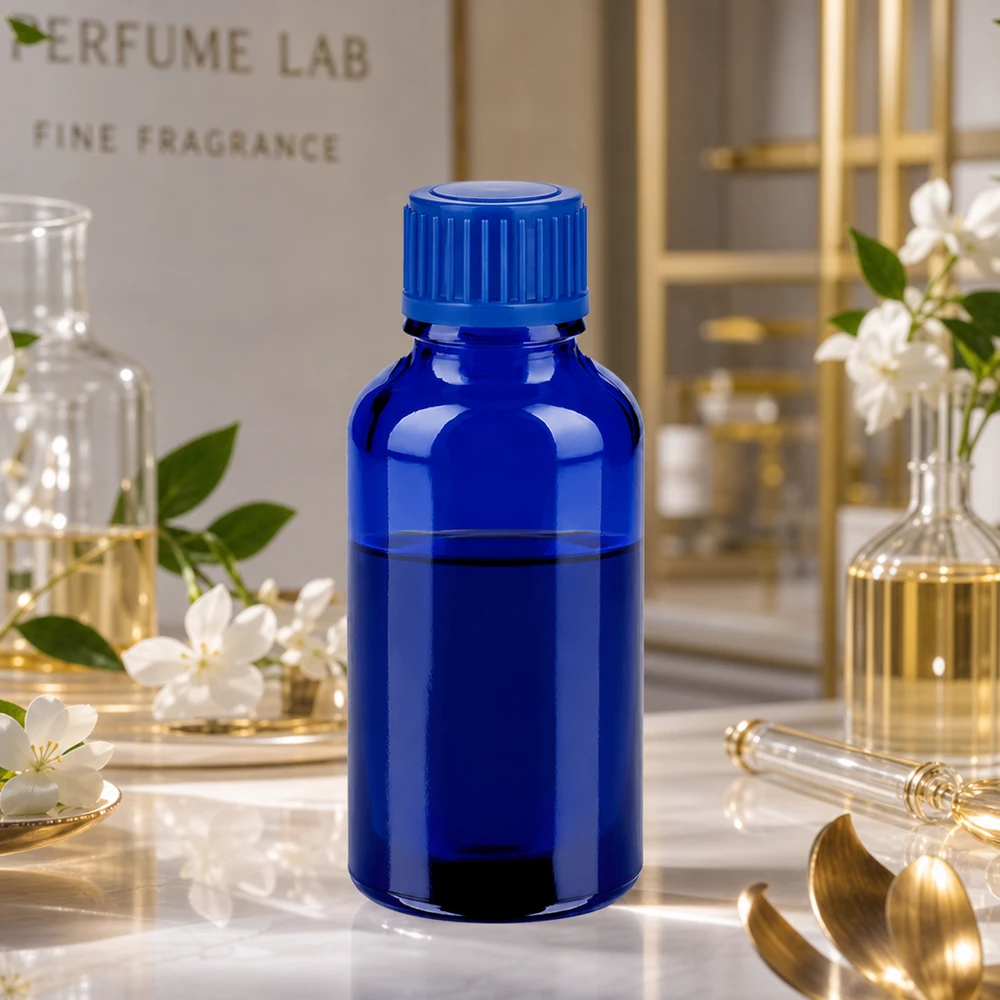 Pequeno frasco de vidro de 30 ml em azul brilhante, ideal para perfumes e essências