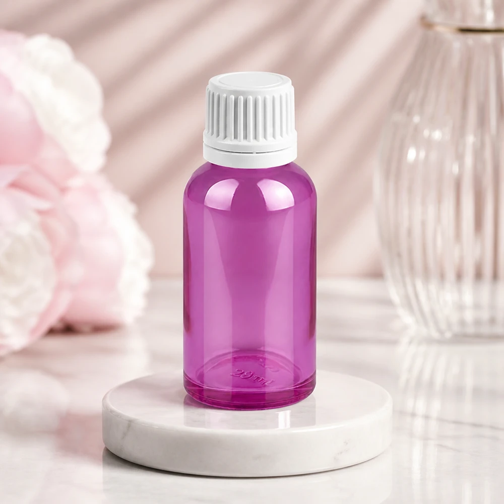 Frasco de 30 ml com abertura de 11 mm em violeta para uma dosagem precisa dos produtos de cuidados da pele