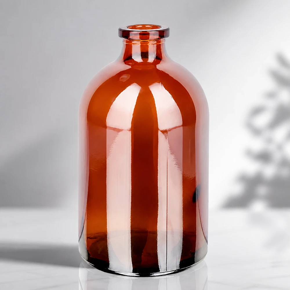Frasco para injectáveis de vidro âmbar 100ml Sterile Glasflasche 100ml in Bernsteinfarbe mit charakteristischer Apothekerflasche-Silhouette