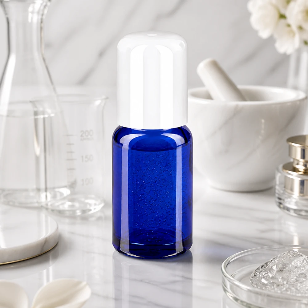 Frasco roll-on STD BlueLine de 10 ml com aplicador de esfera branca para uma dosagem fácil