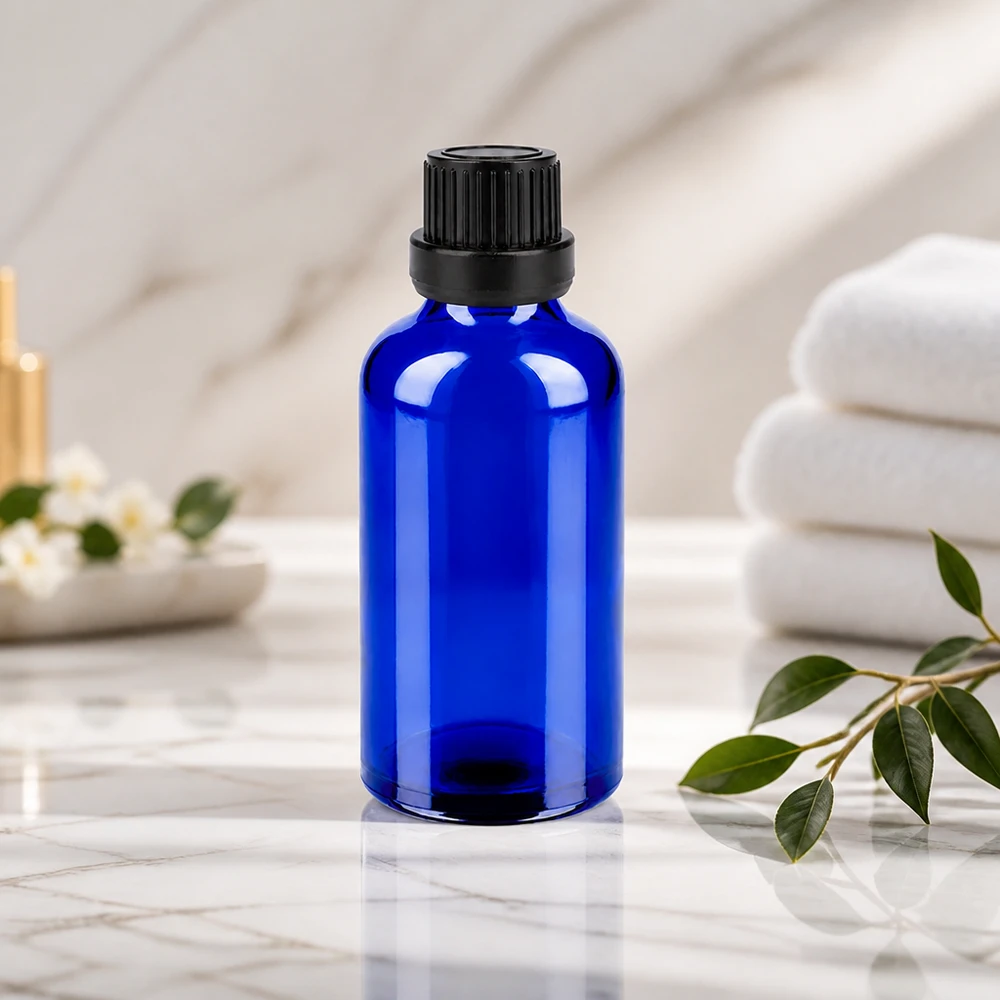 Frasco de 50ml 11mm tampa de rosca preta inviolável BlueLine UT18/50 Frasco de vidro azul elegante de 50 ml com tampa inviolável preta para cosméticos e óleos naturais