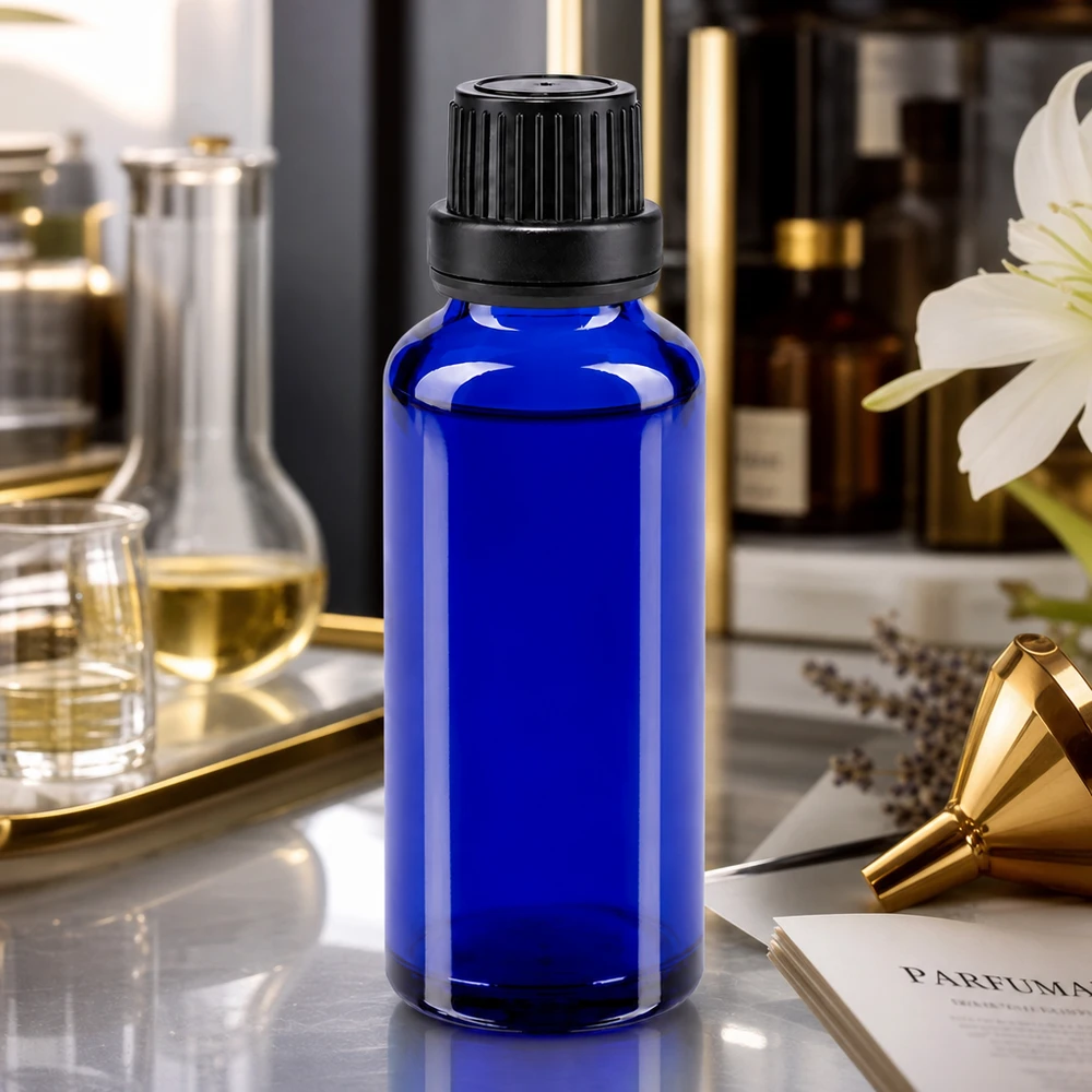 Frasco conta-gotas ApoGlas azul de 30 ml com inserção de 2 mm e tampa preta para a produção de perfumes