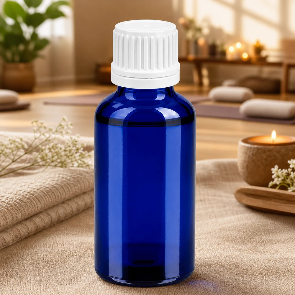 Frasco compacto de 30 ml em vidro azul com proteção UV e tampa branca à prova de crianças