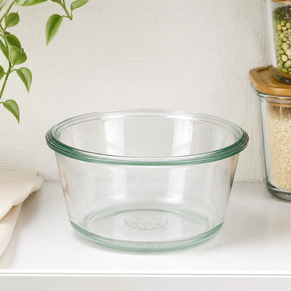290ml Gourmetglas WECK RR100 Frasco gourmet WECK RR100 290 ml vazio sobre bancada de cozinha branca ao lado de frascos de arrumação e planta verde